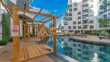 Элитная недвижимость в Махмутларе. Две квартиры 1+1 площадью 55 кв.м. - Ракурс 6