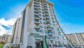 Элитная недвижимость в Махмутларе. Две квартиры 1+1 площадью 55 кв.м. - Ракурс 14