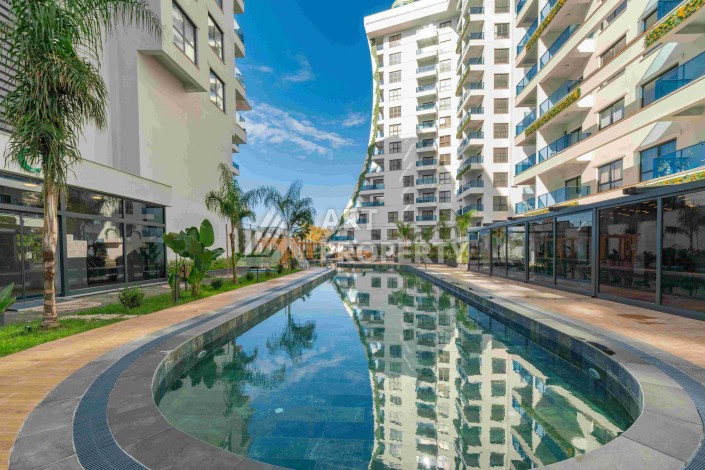 Элитная недвижимость в Махмутларе. Две квартиры 1+1 площадью 55 кв.м. - Ракурс 17