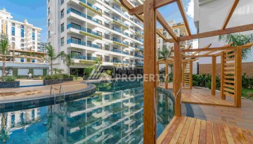 Элитная недвижимость в Махмутларе. Две квартиры 1+1 площадью 55 кв.м. - Ракурс 20