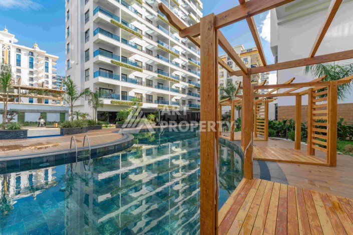 Элитная недвижимость в Махмутларе. Две квартиры 1+1 площадью 55 кв.м. - Ракурс 19