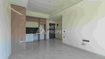 Элитная недвижимость в Махмутларе. Две квартиры 1+1 площадью 55 кв.м. - Ракурс 37