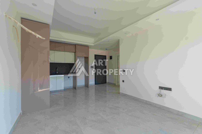 Элитная недвижимость в Махмутларе. Две квартиры 1+1 площадью 55 кв.м. - Ракурс 36