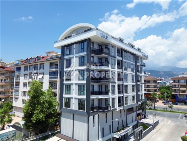 Квартира 1+1 с панорамным остеклением и открытыми видами на город, в комплексе 2024 года - Ракурс 2