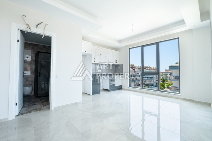 Квартира 1+1 с панорамным остеклением и открытыми видами на город, в комплексе 2024 года - Ракурс 13