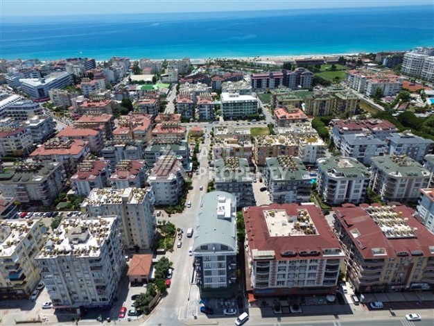 Квартира 1+1 с панорамным остеклением и открытыми видами на город, в комплексе 2024 года - Ракурс 14