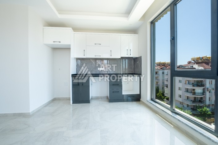 Квартира 1+1 с панорамным остеклением и открытыми видами на город, в комплексе 2024 года - Ракурс 15