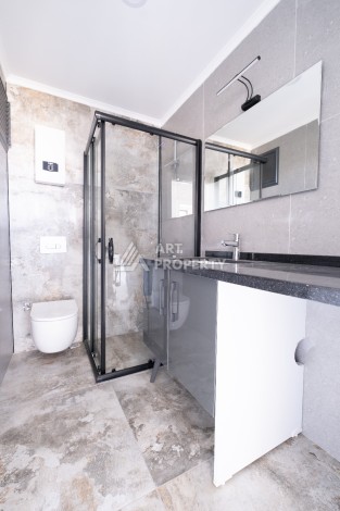 Квартира 1+1 с панорамным остеклением и открытыми видами на город, в комплексе 2024 года - Ракурс 24