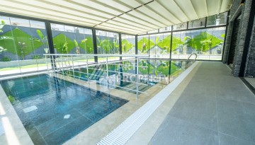 Квартира 1+1 с панорамным остеклением и открытыми видами на город, в комплексе 2024 года - Ракурс 31