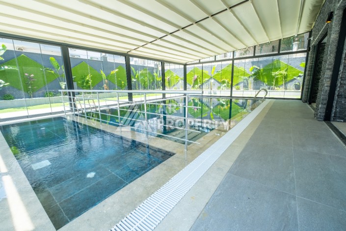 Квартира 1+1 с панорамным остеклением и открытыми видами на город, в комплексе 2024 года - Ракурс 30