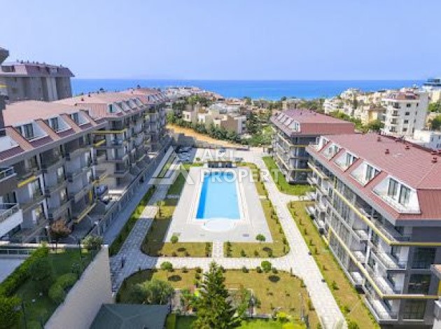 Современная квартира 1+1 в новом комплексе с отельной инфраструктурой в районе Кестель - Ракурс 0