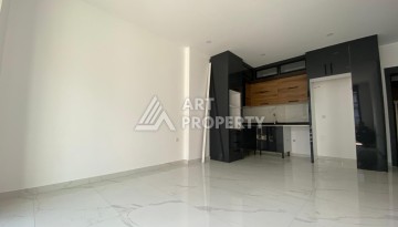 Современная квартира 1+1 в новом комплексе с отельной инфраструктурой в районе Кестель - Ракурс 9