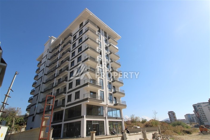 Две квартиры 1+1 в новом жилом комплексе Махмутлара, 47 кв.м. - Ракурс 0