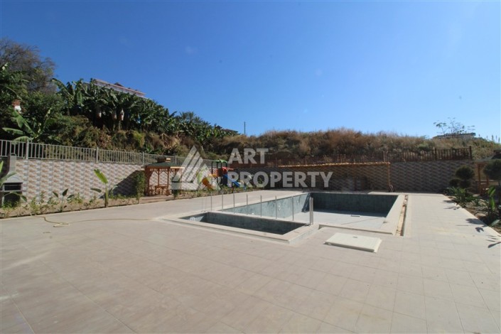 Две квартиры 1+1 в новом жилом комплексе Махмутлара, 47 кв.м. - Ракурс 6