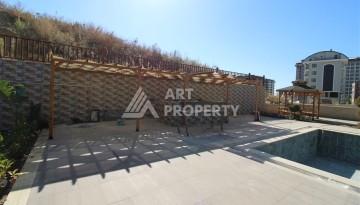 Две квартиры 1+1 в новом жилом комплексе Махмутлара, 47 кв.м. - Ракурс 9