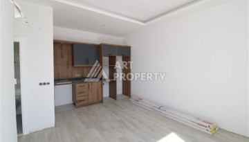 Две квартиры 1+1 в новом жилом комплексе Махмутлара, 47 кв.м. - Ракурс 14