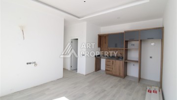 Две квартиры 1+1 в новом жилом комплексе Махмутлара, 47 кв.м. - Ракурс 15