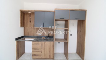 Две квартиры 1+1 в новом жилом комплексе Махмутлара, 47 кв.м. - Ракурс 16