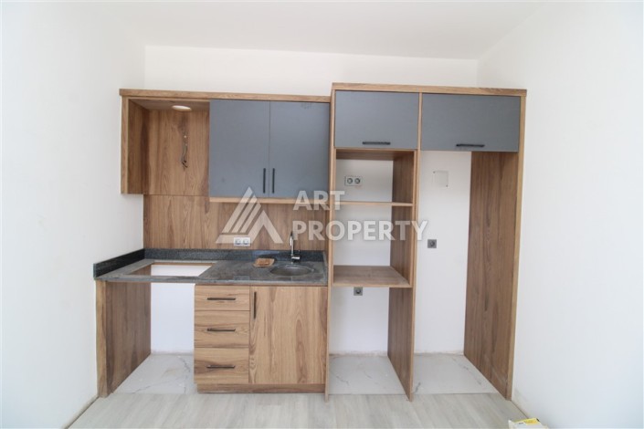 Две квартиры 1+1 в новом жилом комплексе Махмутлара, 47 кв.м. - Ракурс 15