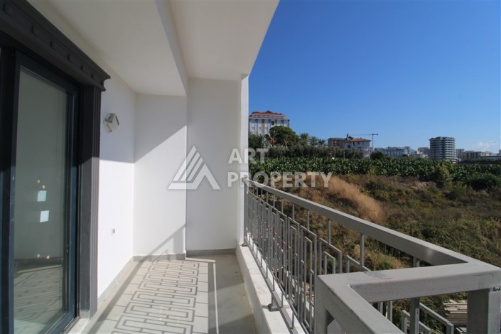 Две квартиры 1+1 в новом жилом комплексе Махмутлара, 47 кв.м. - Ракурс 16