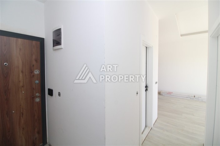 Две квартиры 1+1 в новом жилом комплексе Махмутлара, 47 кв.м. - Ракурс 18