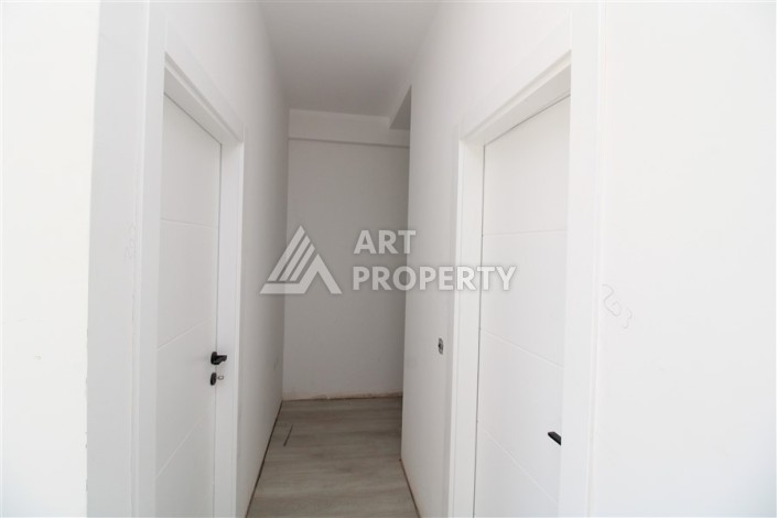 Две квартиры 1+1 в новом жилом комплексе Махмутлара, 47 кв.м. - Ракурс 19