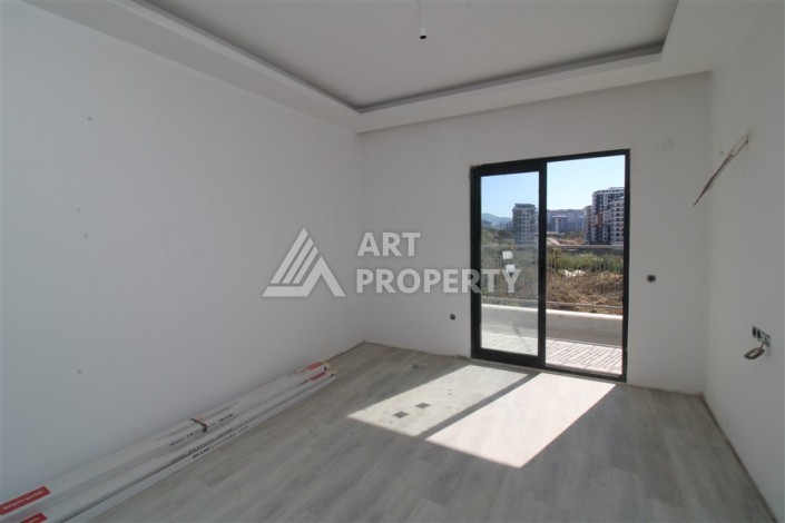 Две квартиры 1+1 в новом жилом комплексе Махмутлара, 47 кв.м. - Ракурс 20