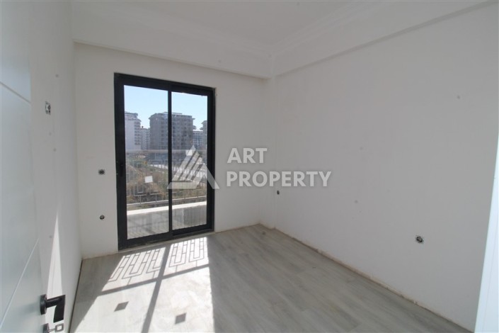 Две квартиры 1+1 в новом жилом комплексе Махмутлара, 47 кв.м. - Ракурс 21