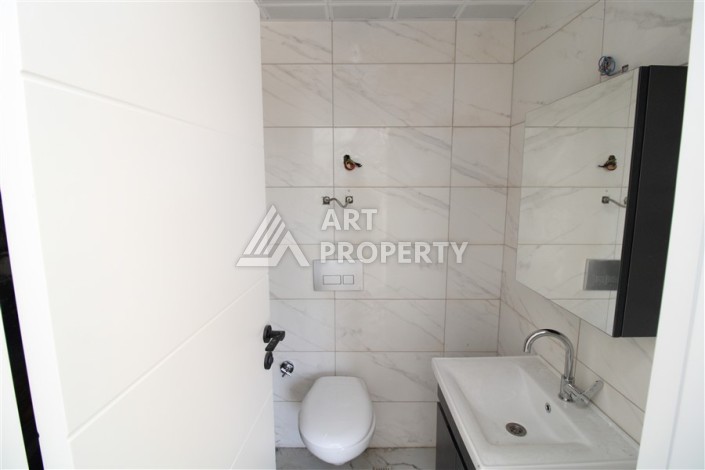 Две квартиры 1+1 в новом жилом комплексе Махмутлара, 47 кв.м. - Ракурс 23