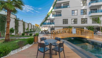 Квартира 1+1 с большим балконом в новом доме, 60 кв.м. Махмутлар, Алания - Ракурс 2