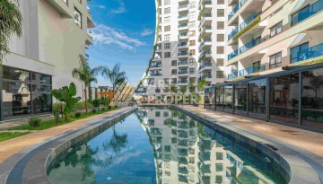 Квартира 1+1 с большим балконом в новом доме, 60 кв.м. Махмутлар, Алания - Ракурс 3