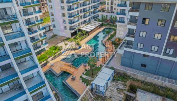 Квартира 1+1 с большим балконом в новом доме, 60 кв.м. Махмутлар, Алания - Ракурс 4