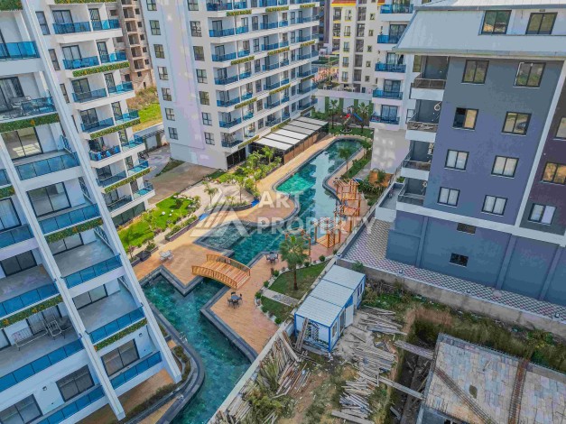 Квартира 1+1 с большим балконом в новом доме, 60 кв.м. Махмутлар, Алания - Ракурс 3