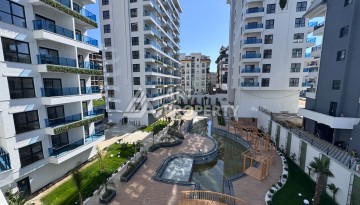 Квартира 1+1 с большим балконом в новом доме, 60 кв.м. Махмутлар, Алания - Ракурс 7