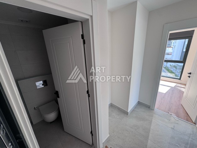 Квартира 1+1 с большим балконом в новом доме, 60 кв.м. Махмутлар, Алания - Ракурс 8