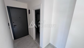 Квартира 1+1 с большим балконом в новом доме, 60 кв.м. Махмутлар, Алания - Ракурс 10