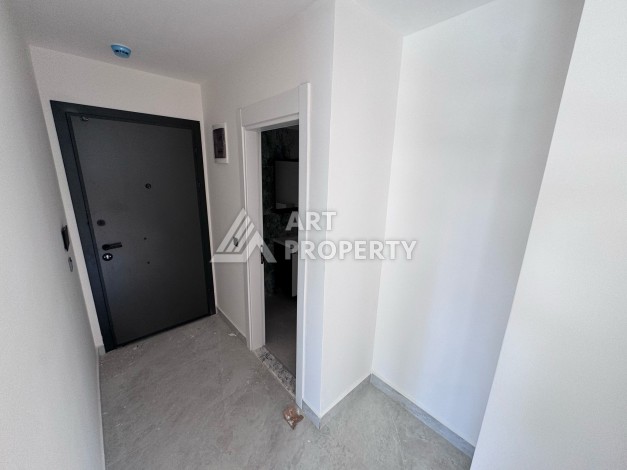 Квартира 1+1 с большим балконом в новом доме, 60 кв.м. Махмутлар, Алания - Ракурс 9