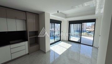 Квартира 1+1 с большим балконом в новом доме, 60 кв.м. Махмутлар, Алания - Ракурс 11