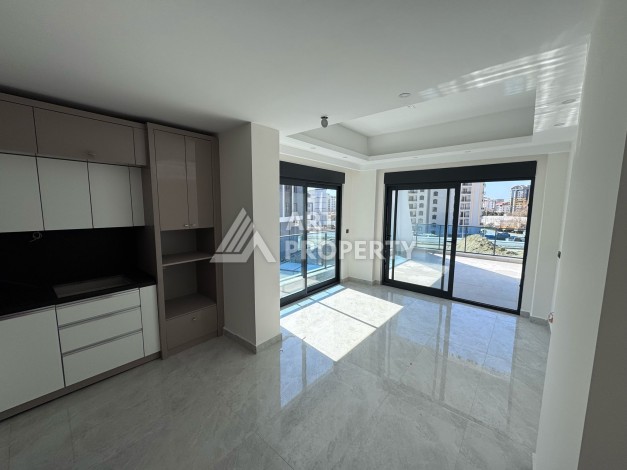 Квартира 1+1 с большим балконом в новом доме, 60 кв.м. Махмутлар, Алания - Ракурс 10