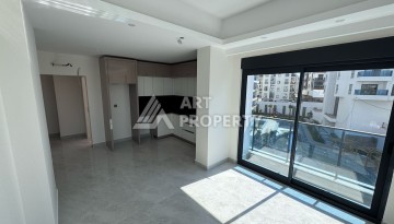 Квартира 1+1 с большим балконом в новом доме, 60 кв.м. Махмутлар, Алания - Ракурс 12