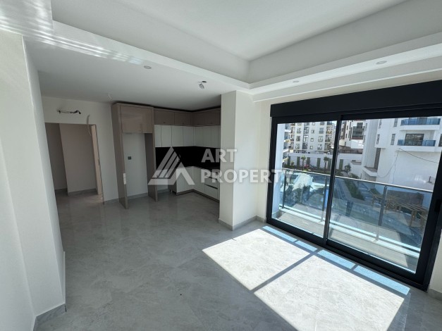 Квартира 1+1 с большим балконом в новом доме, 60 кв.м. Махмутлар, Алания - Ракурс 11