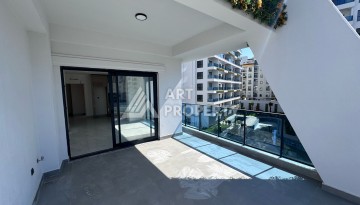 Квартира 1+1 с большим балконом в новом доме, 60 кв.м. Махмутлар, Алания - Ракурс 14