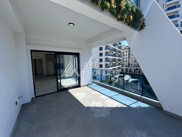 Квартира 1+1 с большим балконом в новом доме, 60 кв.м. Махмутлар, Алания - Ракурс 13