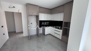 Квартира 1+1 с большим балконом в новом доме, 60 кв.м. Махмутлар, Алания - Ракурс 15