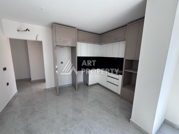 Квартира 1+1 с большим балконом в новом доме, 60 кв.м. Махмутлар, Алания - Ракурс 14