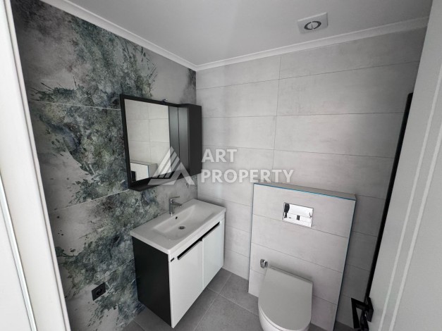 Квартира 1+1 с большим балконом в новом доме, 60 кв.м. Махмутлар, Алания - Ракурс 16