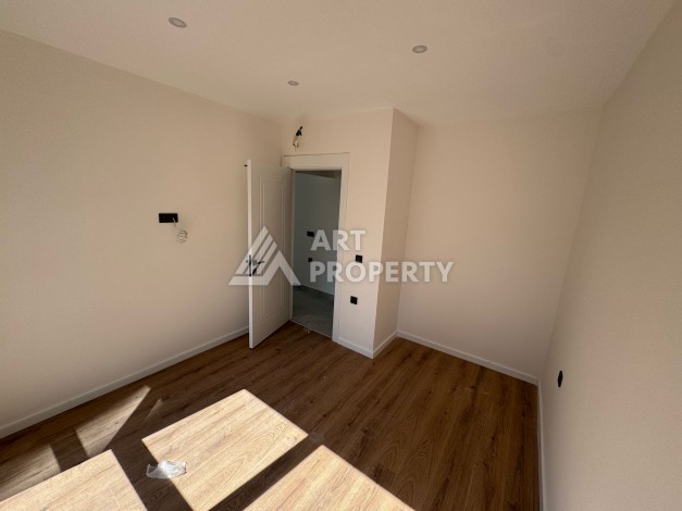 Квартира 1+1 с большим балконом в новом доме, 60 кв.м. Махмутлар, Алания - Ракурс 17