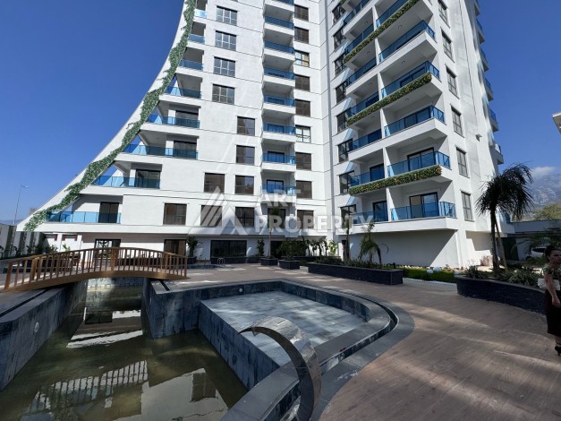 Квартира 1+1 с большим балконом в новом доме, 60 кв.м. Махмутлар, Алания - Ракурс 18