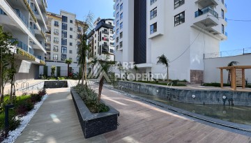 Квартира 1+1 с большим балконом в новом доме, 60 кв.м. Махмутлар, Алания - Ракурс 20