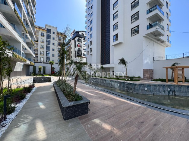 Квартира 1+1 с большим балконом в новом доме, 60 кв.м. Махмутлар, Алания - Ракурс 19